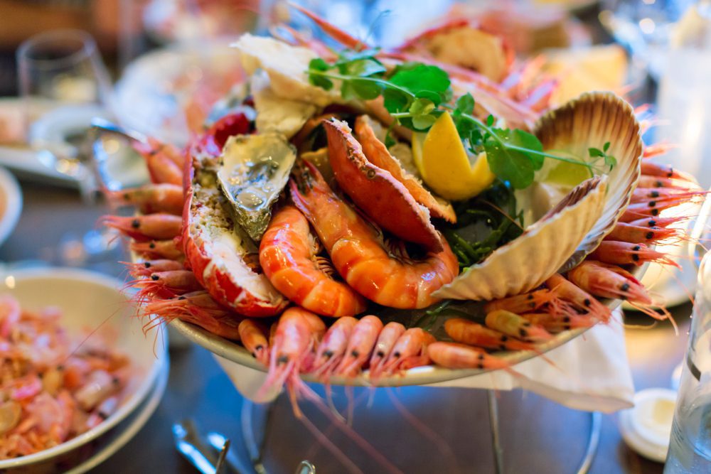 Traditional,Fresh,Seafood,Plate,At,The,Restaurant,,oslo-norway,shrimp,oyster,,crab,And,Scallop